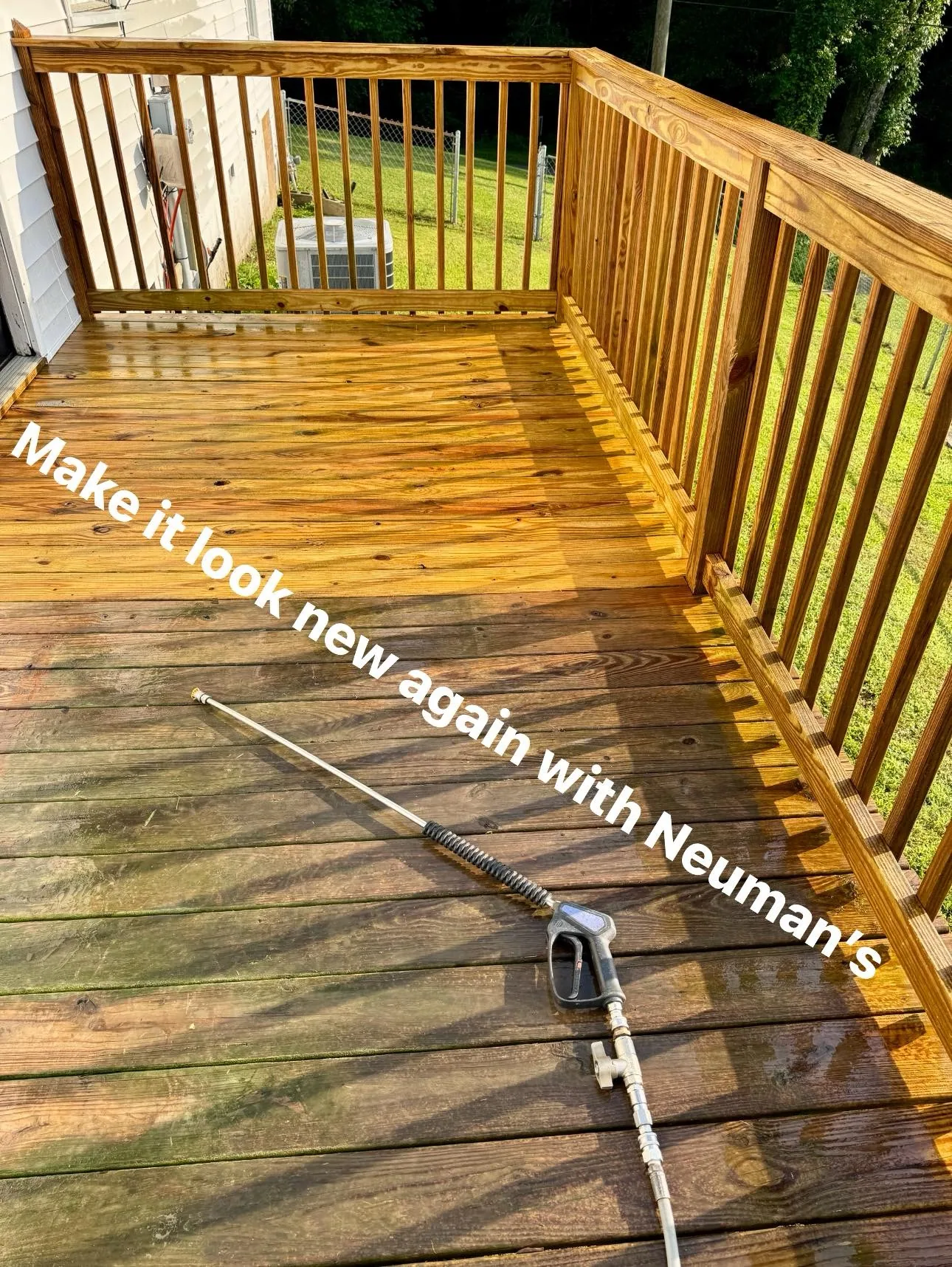 Professional deck cleaning in progress by Neumans Pressure Washing