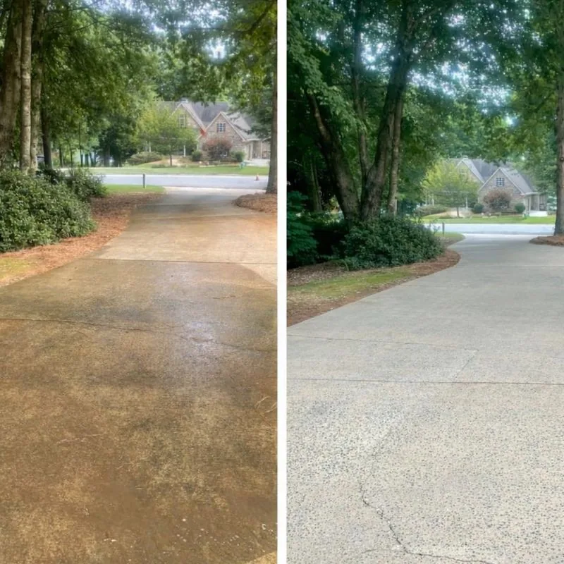 Driveway being cleaned by Neumans Pressure Washing