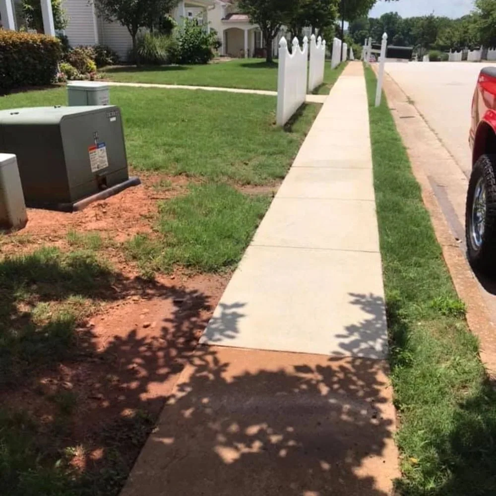 Sidewalk before and after professional surface cleaning